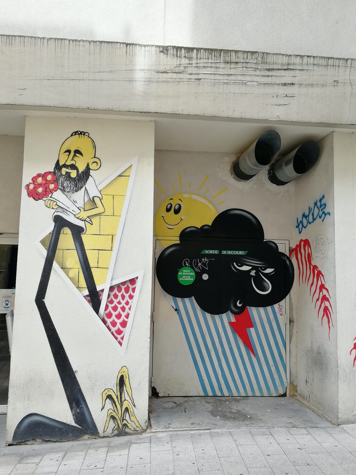 Man with Flowers and Storm Cloud — Street art in Angers