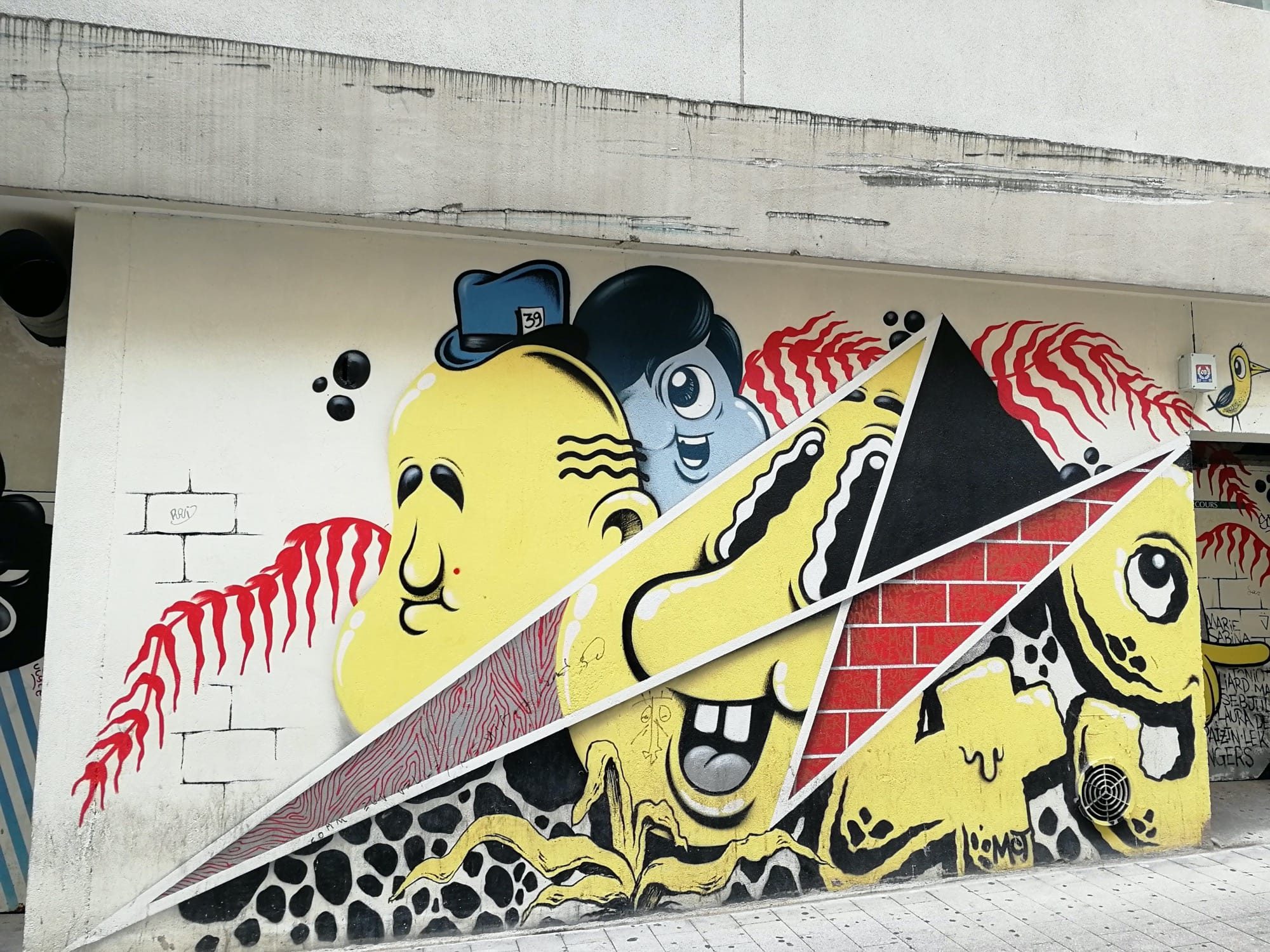 Yellow Grotesque Creatures – Üombi — Street art in Angers