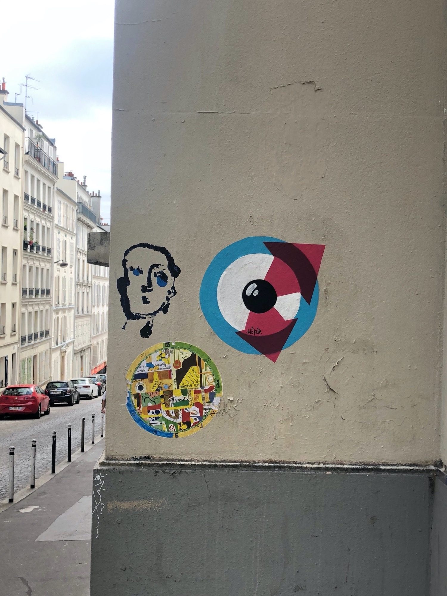 Œil de WÈKUP rue Chappe — Street art de Monsieur plus à Paris