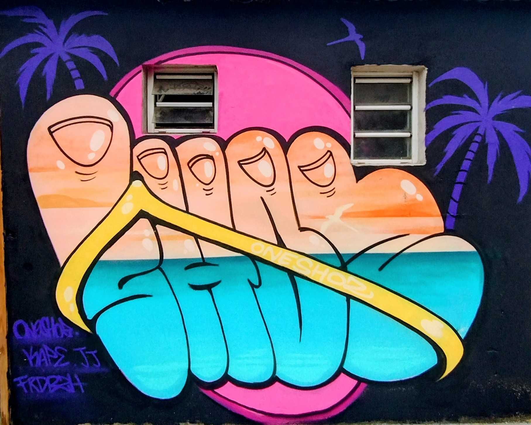 Tropical Hand and Wave — Street art in Saint-Paul