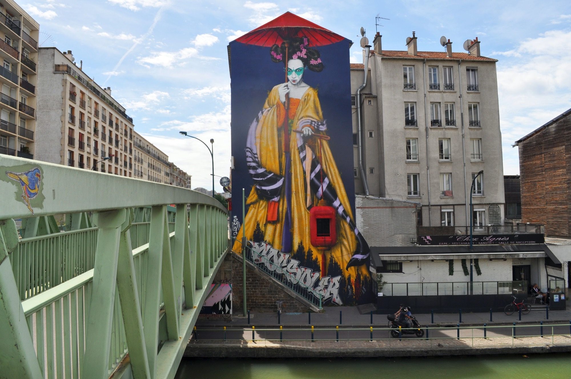 Woman with a Red Parasol in Pantin — Street art by Fin Dac in Pantin