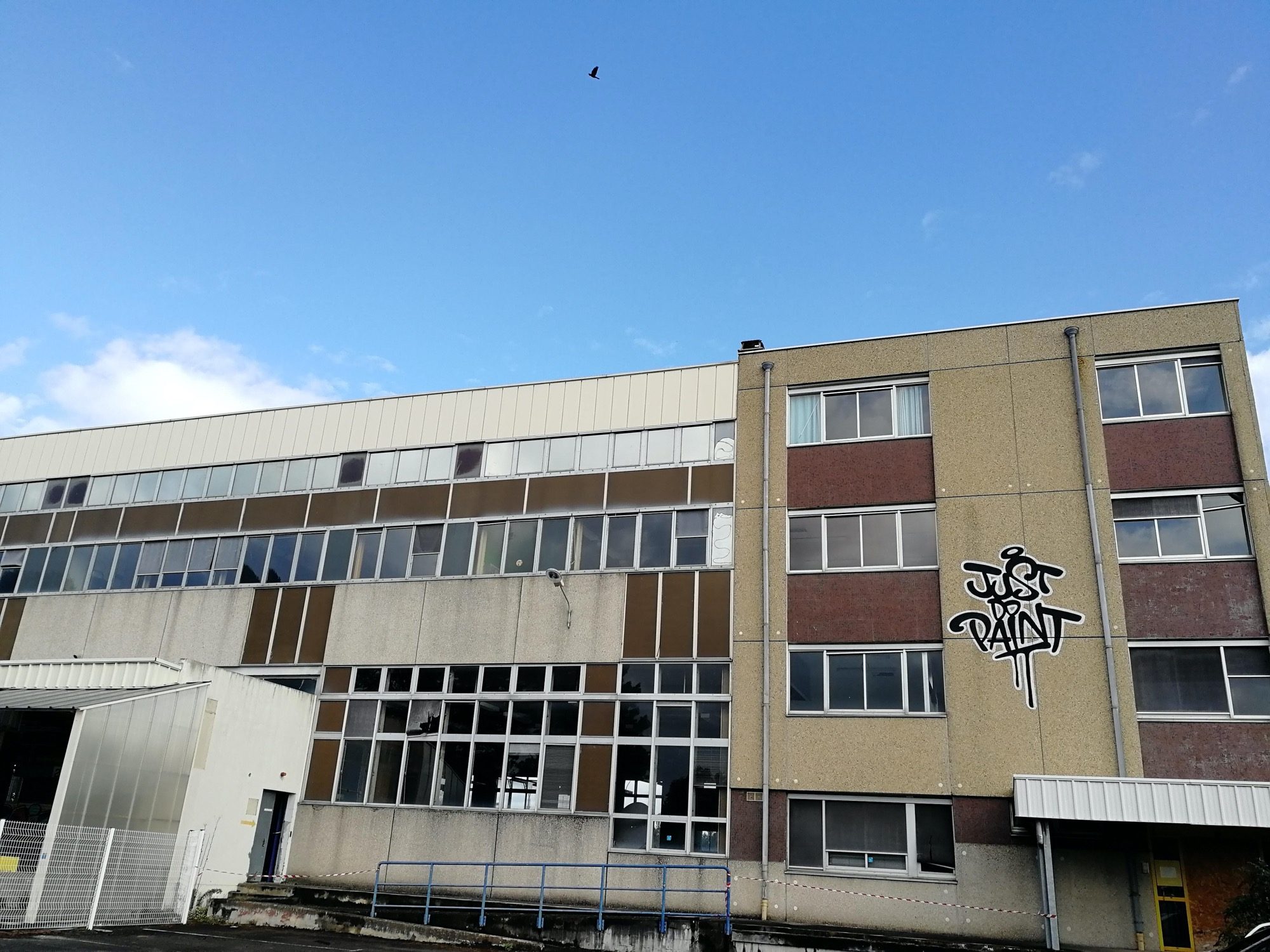 Just Paint Tag on Industrial Wasteland — Street art in Ploufragan