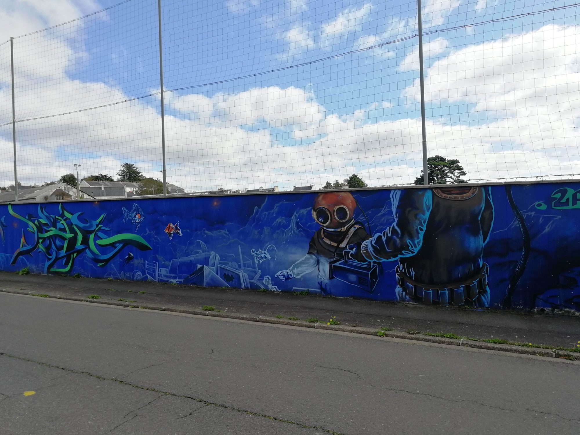 Diver and Graffiti on Blue Wall, Morlaix — Street art in Morlaix