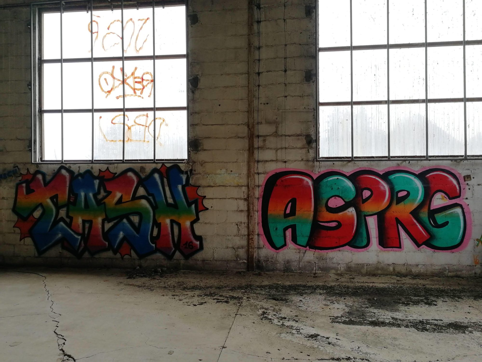 Smash and APRG in the Derelict Hall — Street art in Issé