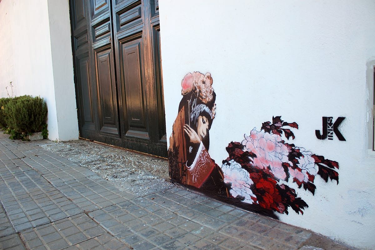 The Flamenco Dancer and the Flowers — Street art by Jinks Kunst in Albaida del Aljarafe