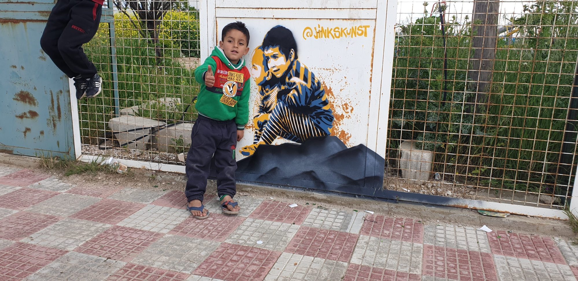 The boy from the Bar Elias camp — Street art by Jinks Kunst in Bar Elias
