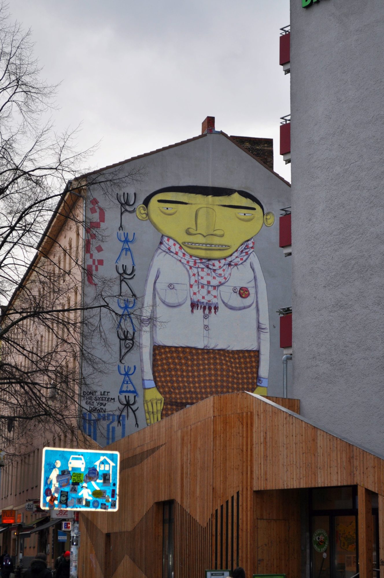Os Gemeos Character in Berlin — Street art by Osgemeos in Berlin