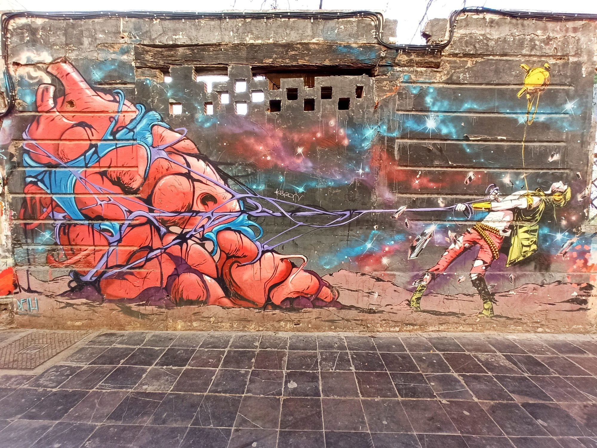 Le haleur et la masse rouge — Street art de Deih xlf à València