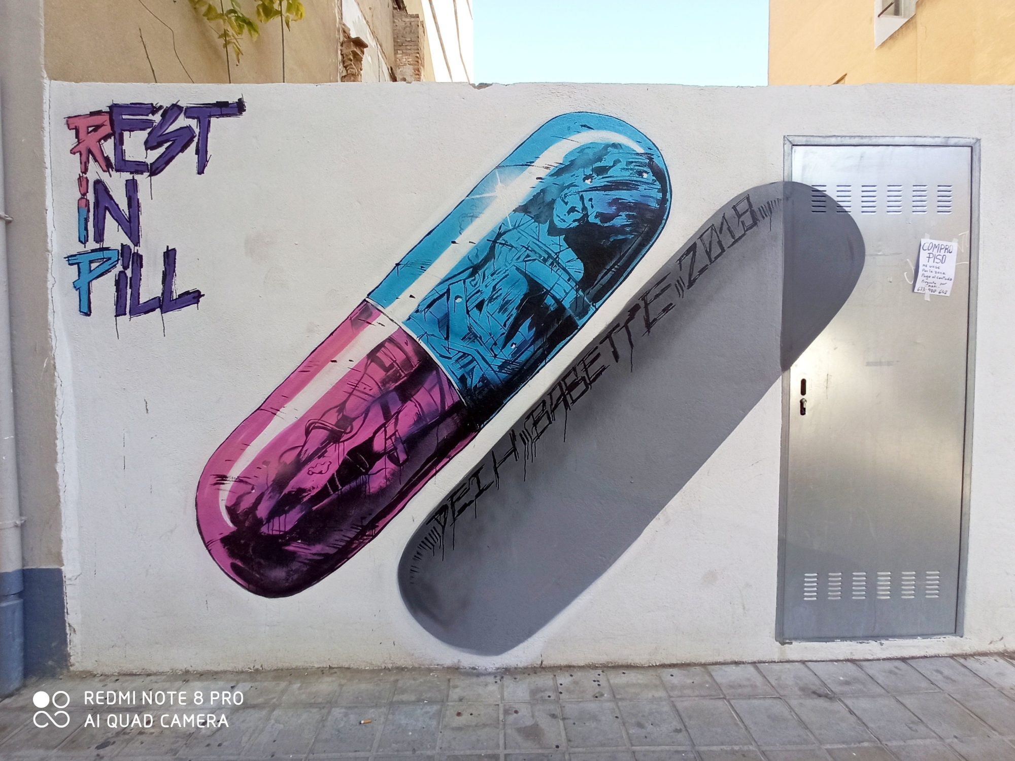 Rest in Pill, the Giant Capsule — Street art by Deih xlf in València