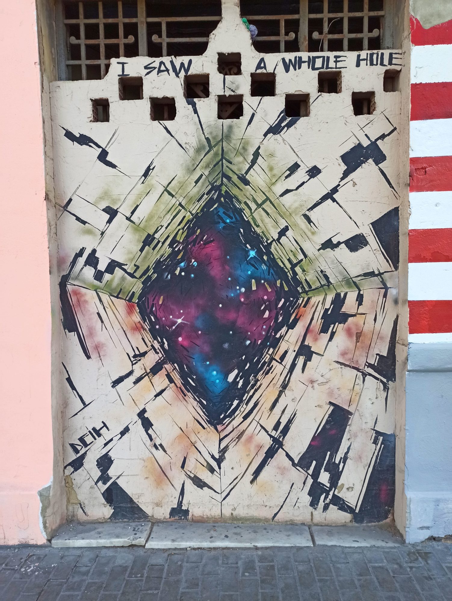 I Saw a Whole Hole, the Cosmic Door — Street art by Deih xlf in València