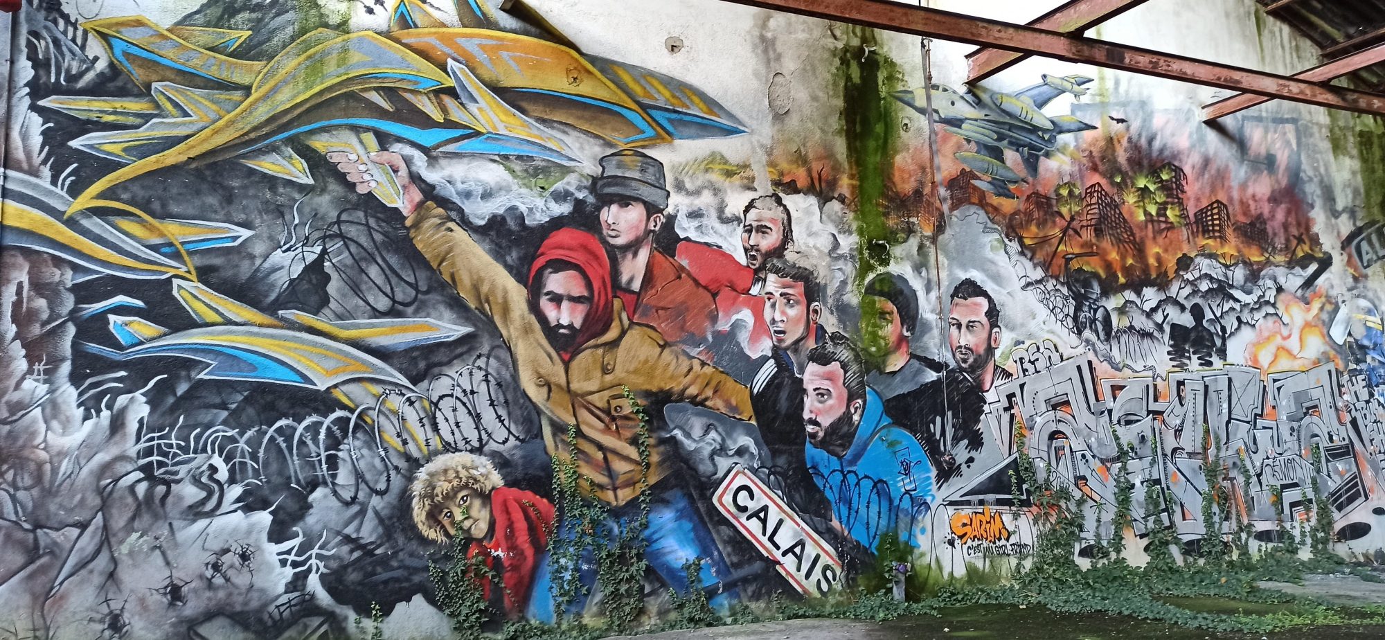 Fresque de solidarité avec les migrants de Calais — Street art à Lorient