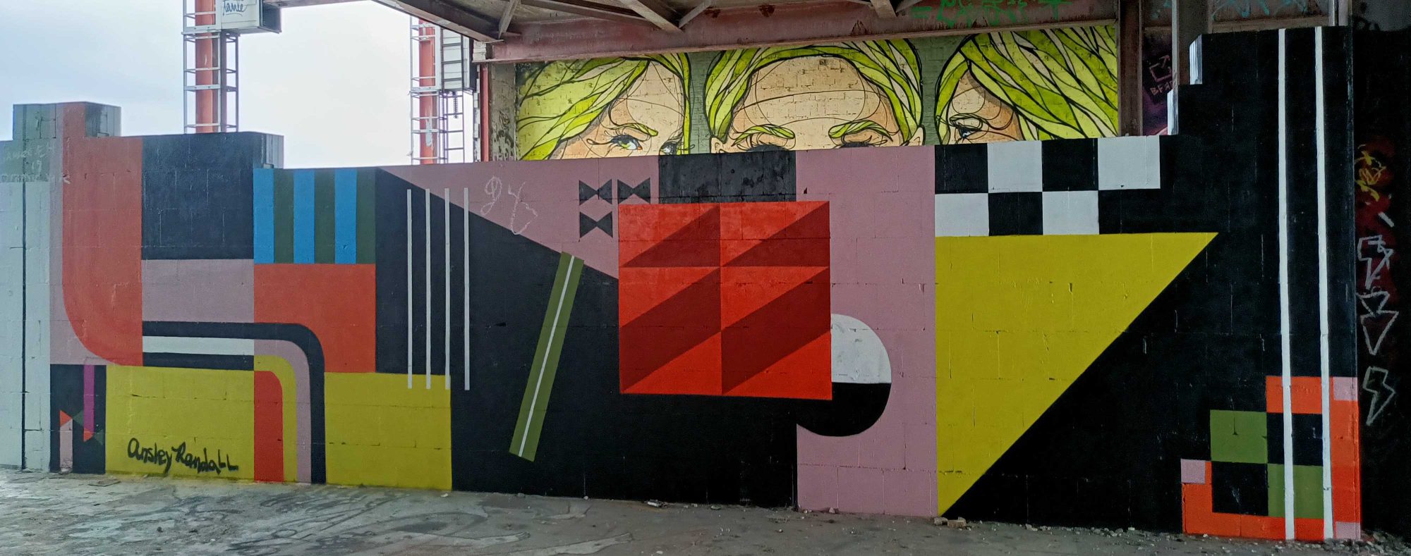 Abstract Geometric Composition in Red and Black — Street art by Ansley Randall in Berlin
