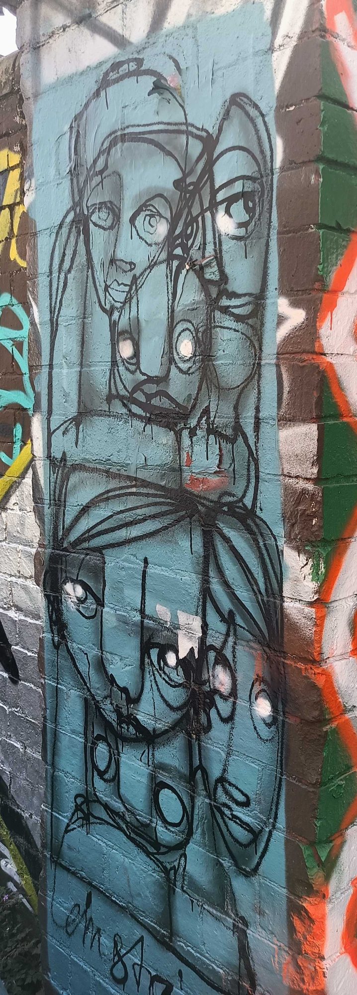 Three Stacked Raw Faces — Street art in London