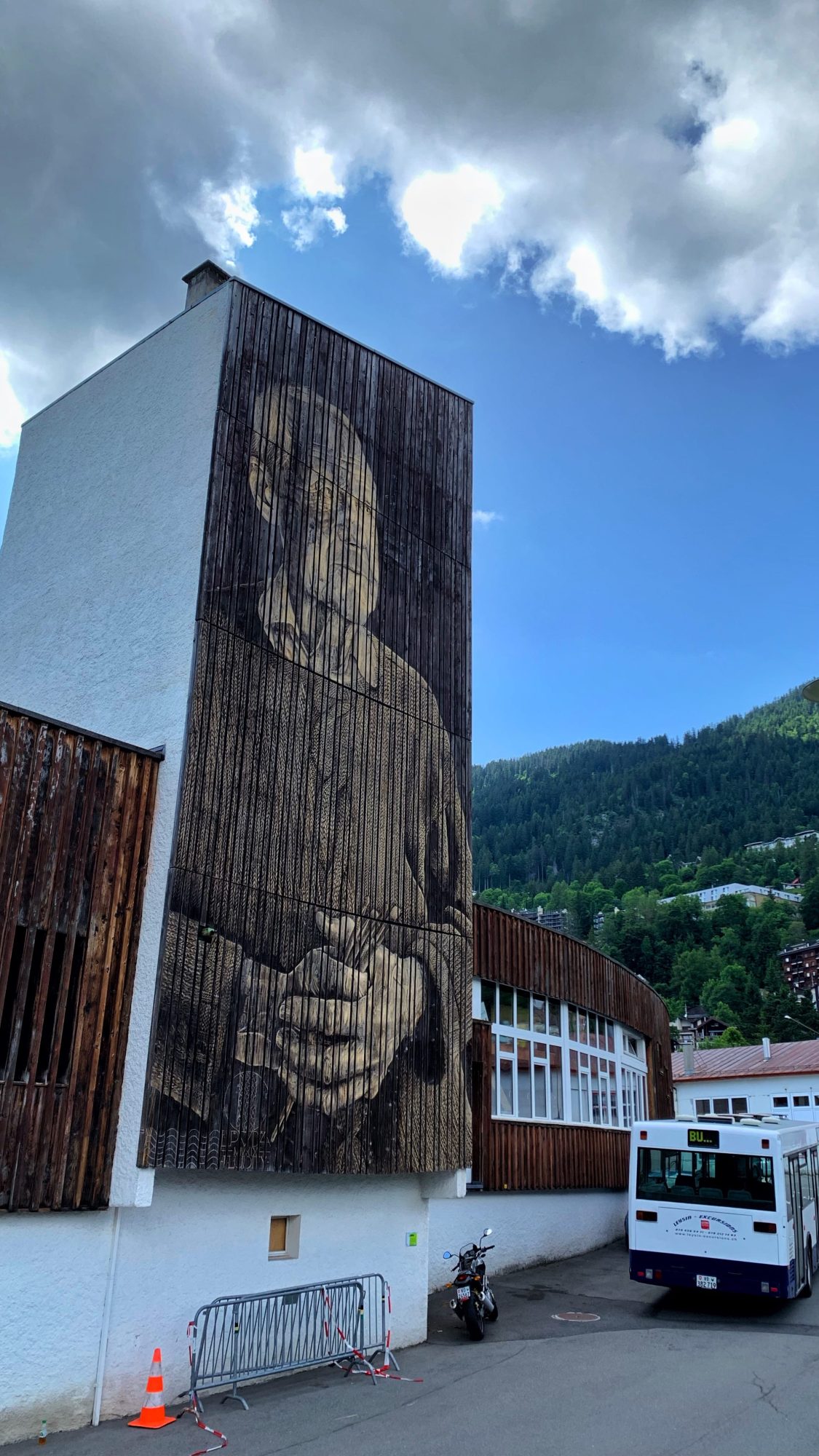 The old man with clasped hands — Street art by LPVDA in Leysin
