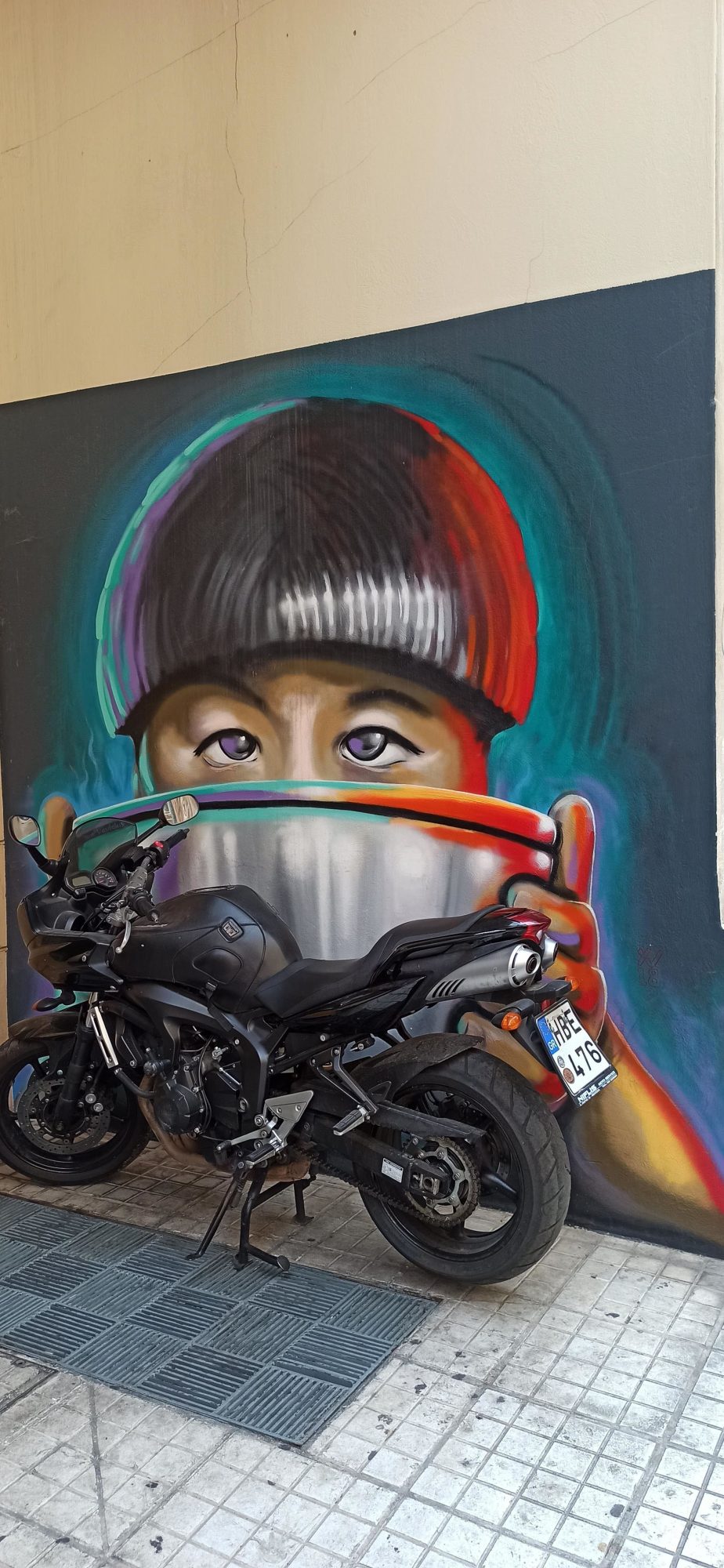 Rider in a Chrome Helmet — Street art in Athina