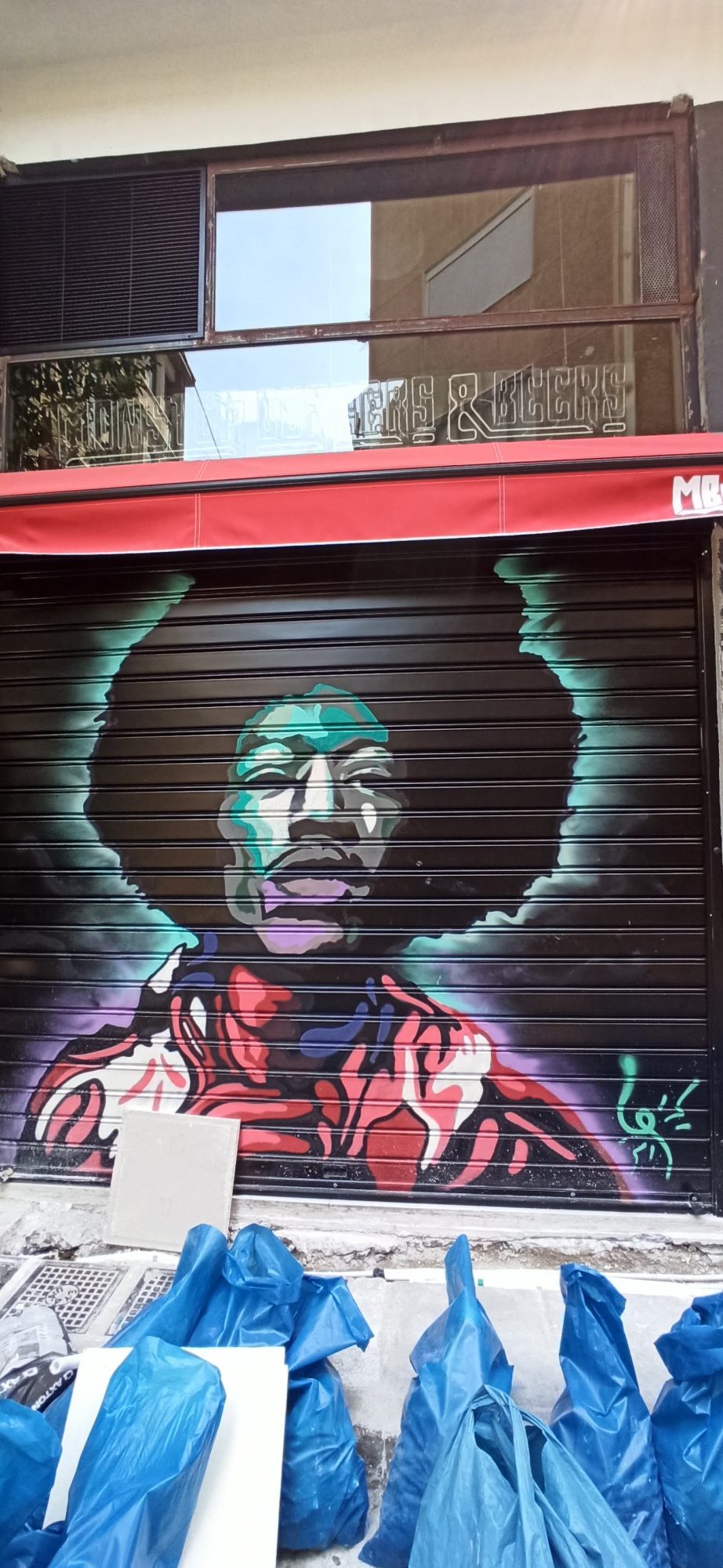 Jimi Hendrix on the Shutter — Street art in Athina