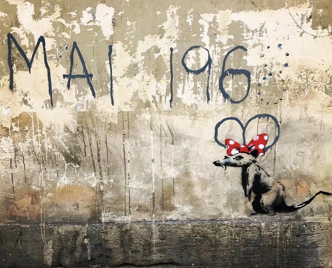 The Rat with the Red Bow and the Heart — Street art by Banksy in Paris