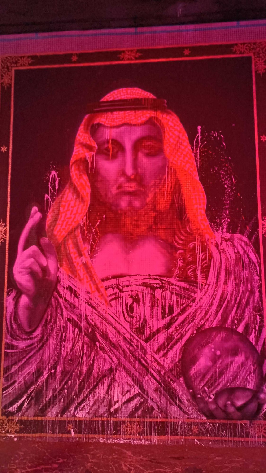 Religious Icon Bathed in Red — Street art in Paris