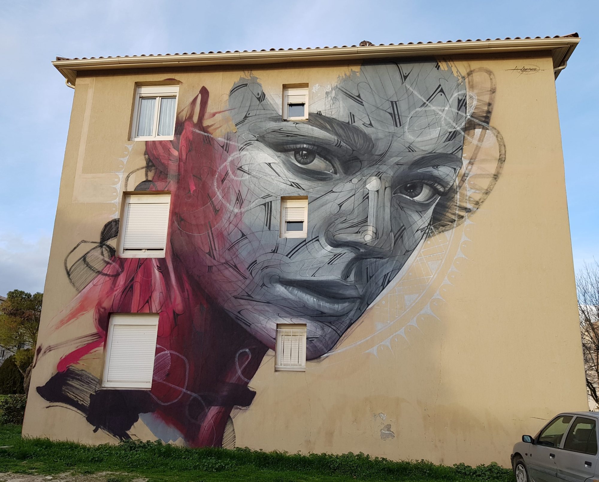 Geometric Portrait with Violet Tones — Street art by Hopare in Uzès