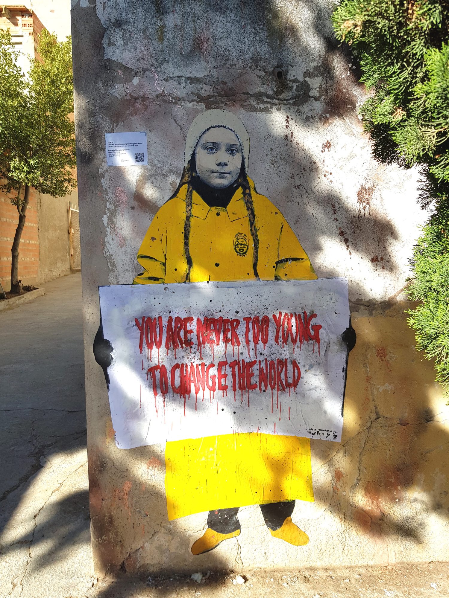Greta Thunberg and Her Placard — Street art by Tvboy in Penelles