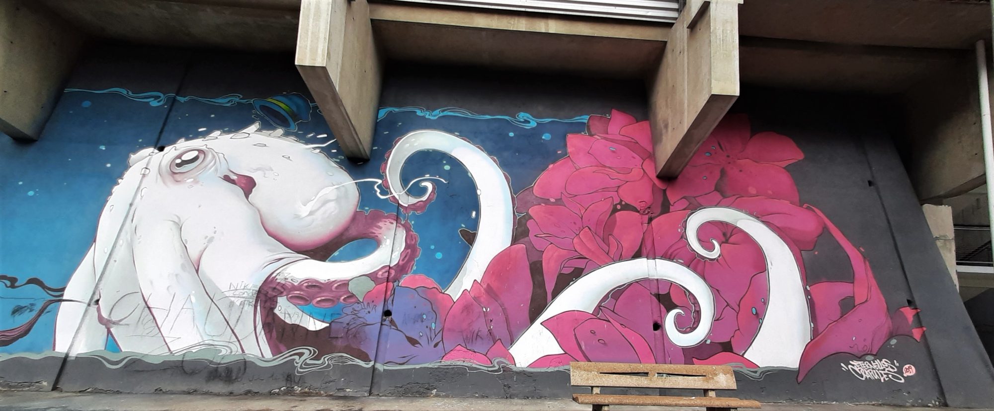 White Octopus and Pink Flowers — Street art by Kalouf in Moutiers