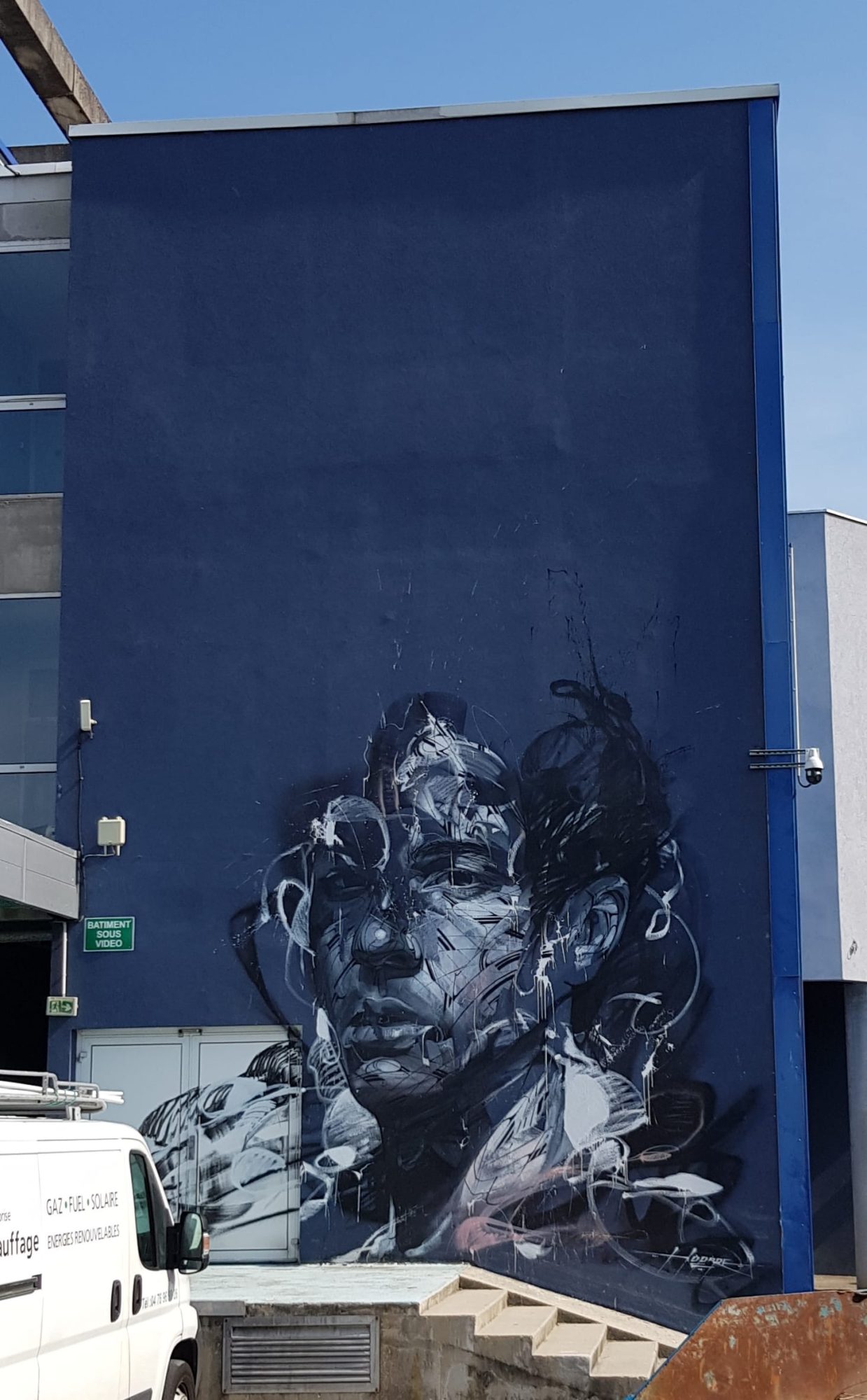 Hopare's Monumental Portrait — Street art by Hopare in Échirolles