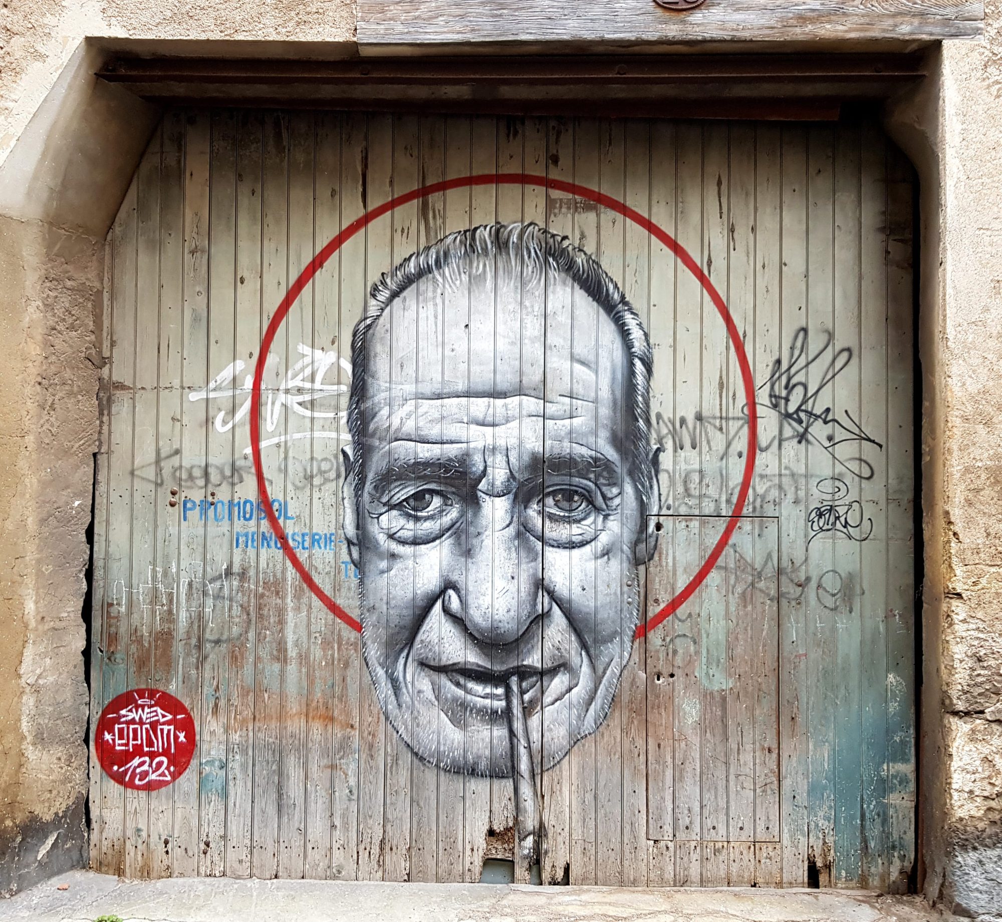 Man with Circular Red Halo — Street art by SWED ONER in Sète