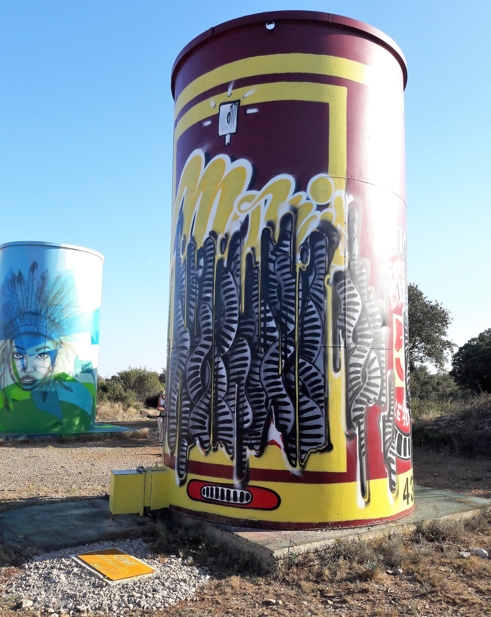 Momies on Red Silo — Street art by Momies in Gigean