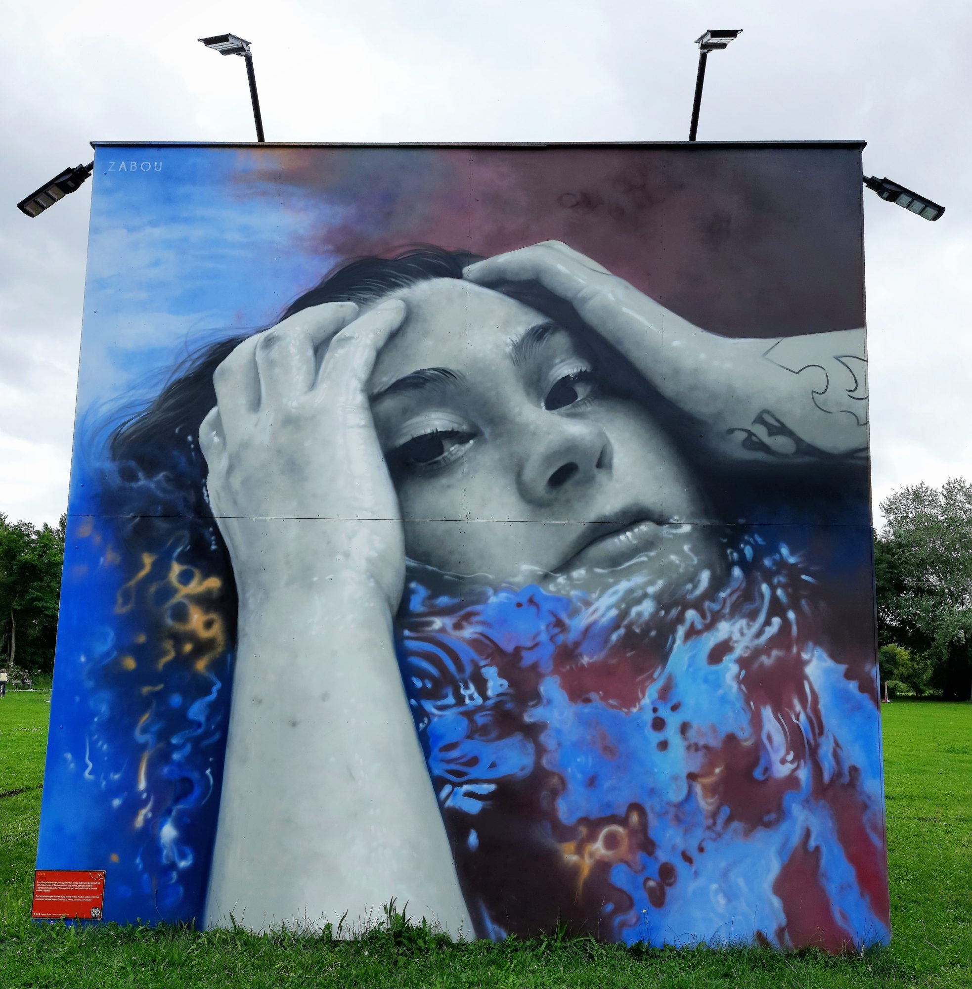 Submerged Woman, Hands to Face — Street art by ZABOU in Le Mans
