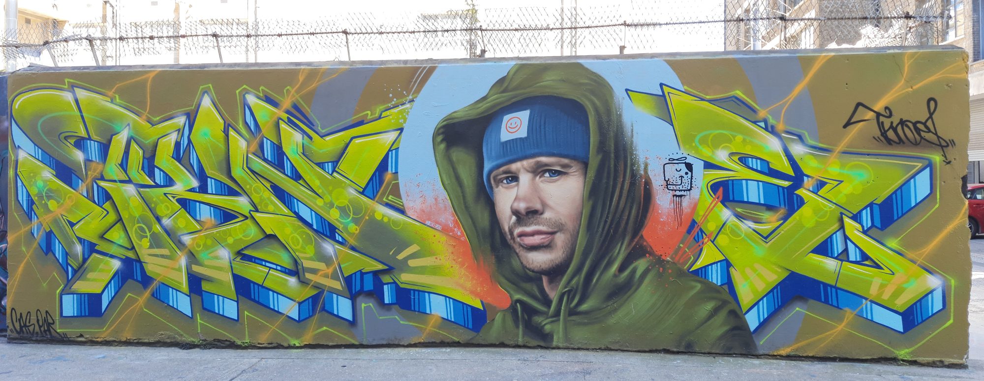 Hooded portrait between two wildstyle pieces — Street art by WOSKerski in London