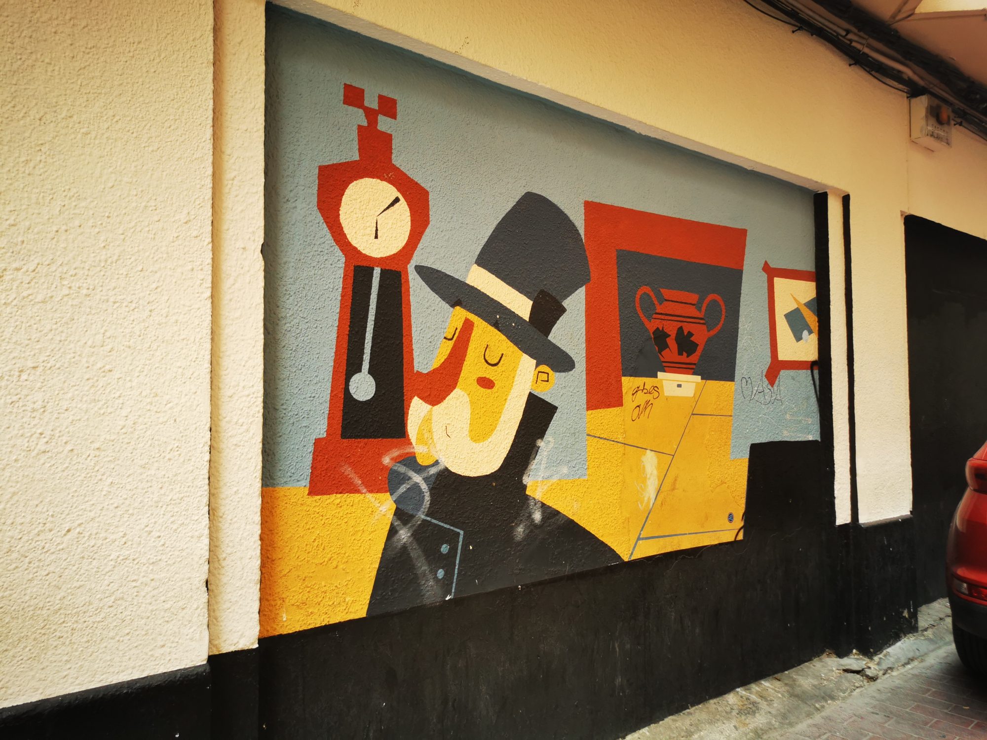 L'homme au chapeau et l'horloge — Street art à Zaragoza