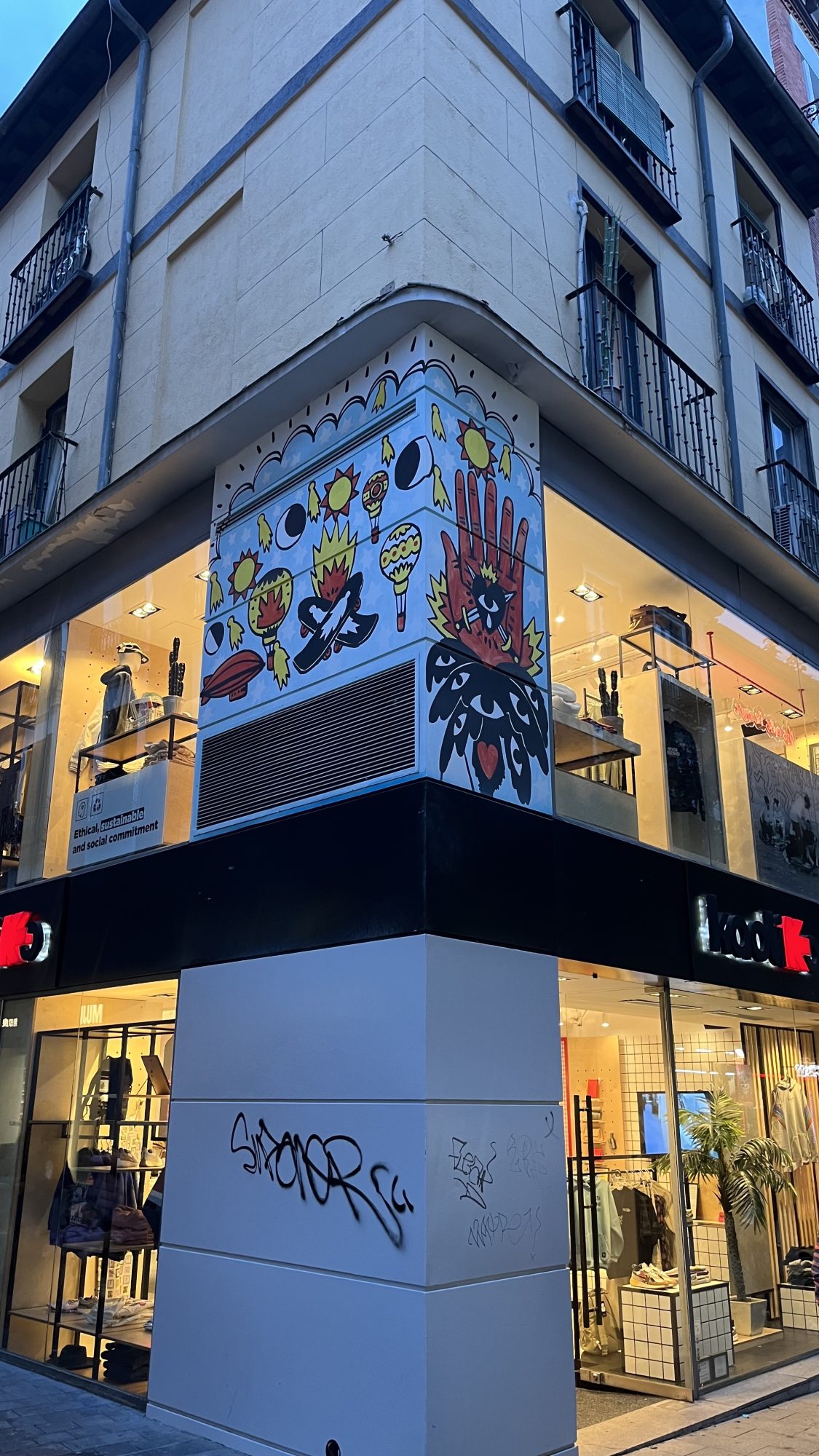 Red Hands and Hearts on the Corner — Street art in Madrid