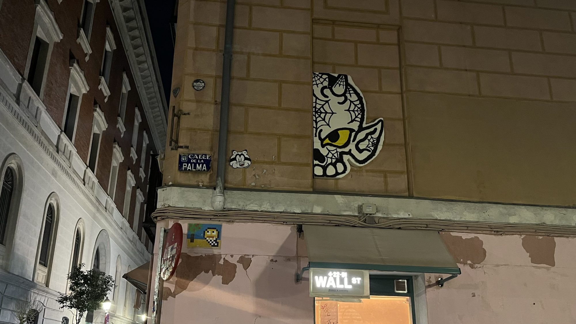 Yellow-Eyed Creature on Calle de la Palma — Street art in Madrid