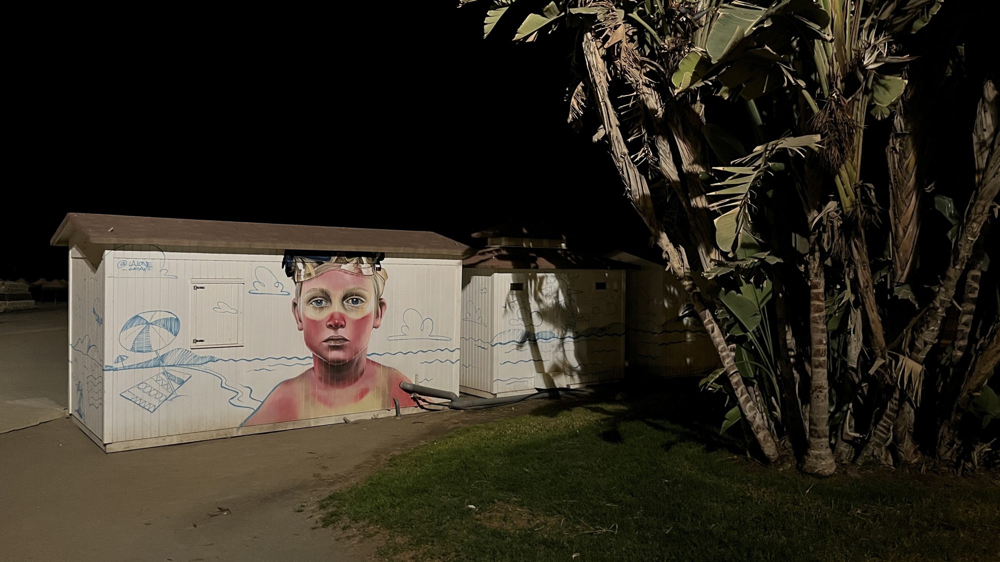Child's Portrait on a Beach Hut — Street art by LALONE in Málaga