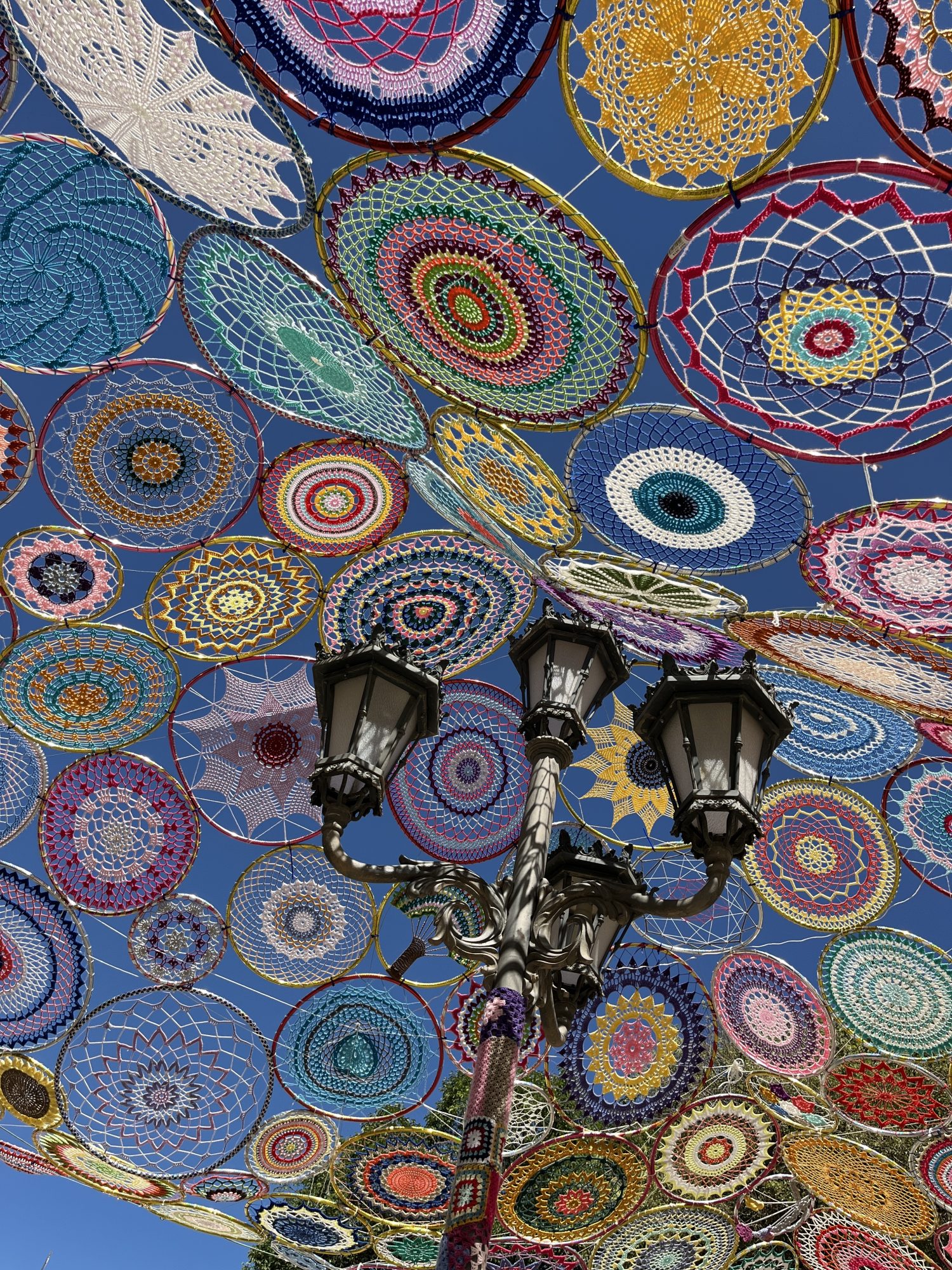 Ceiling yarn bombing in Ronda — Street art in Ronda