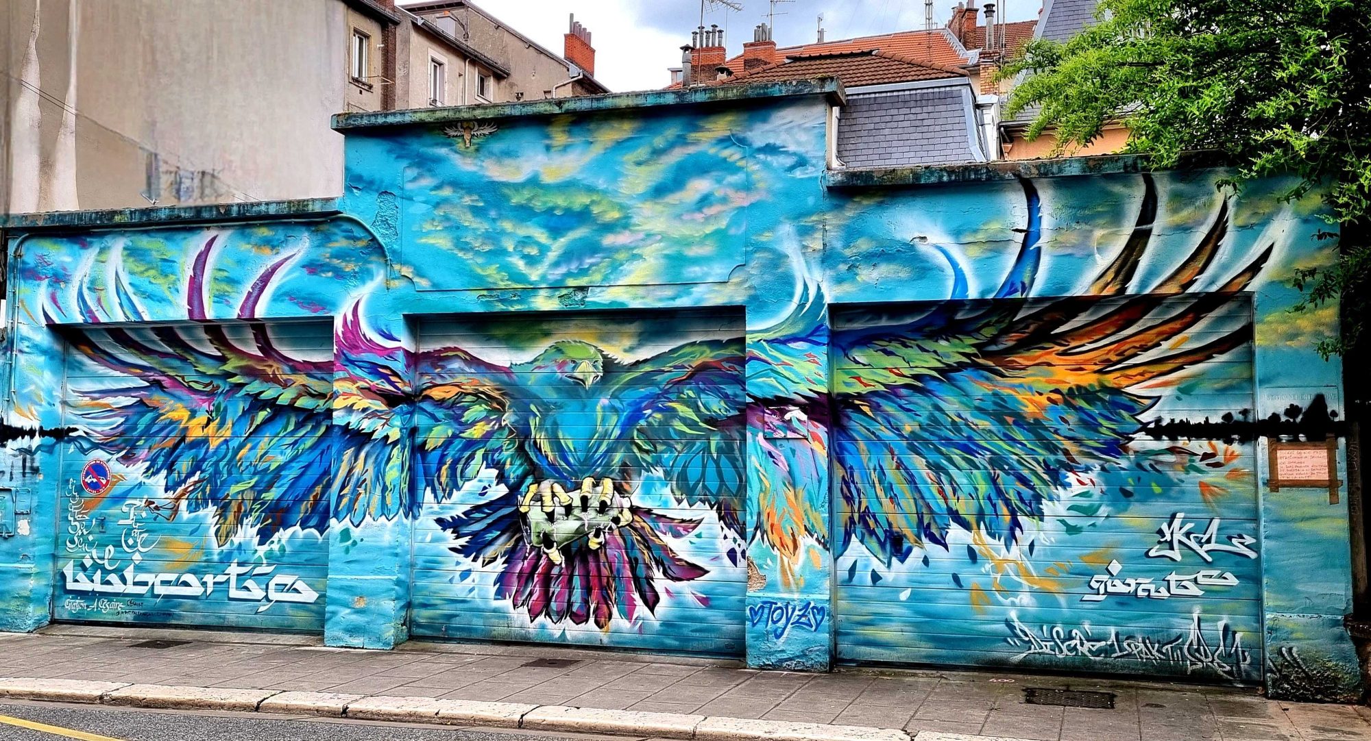 Large Bird with Spread Wings — Street art by Srek, Greg Di Pasquale, Killah One in Grenoble