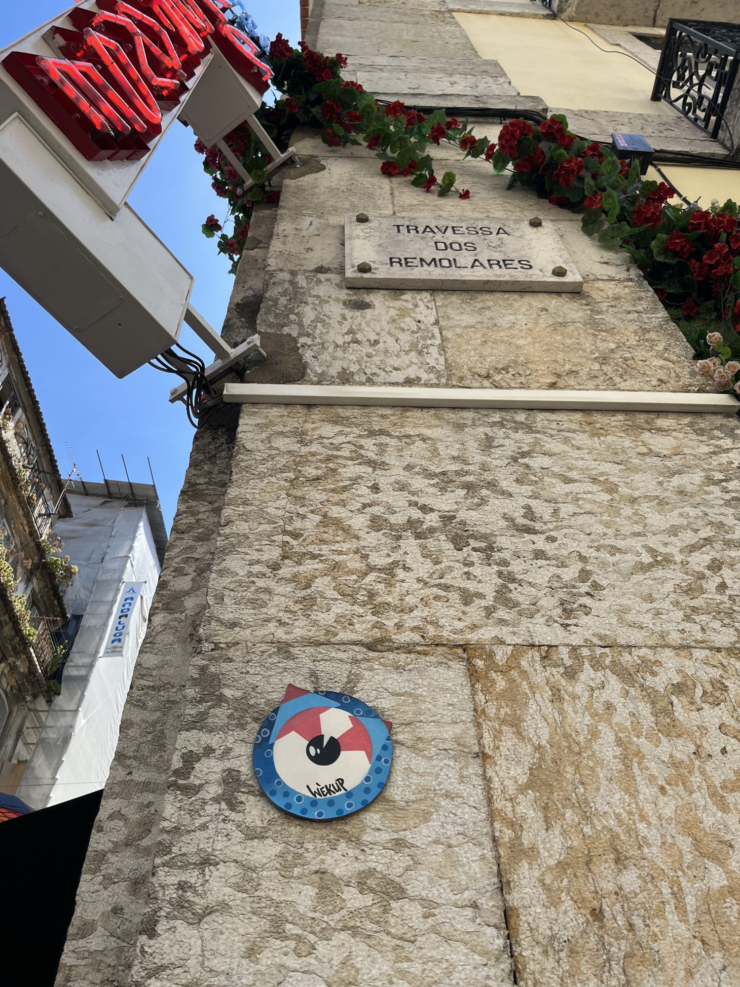 Cat Sticker below the Street Plaque — Street art in Lisboa