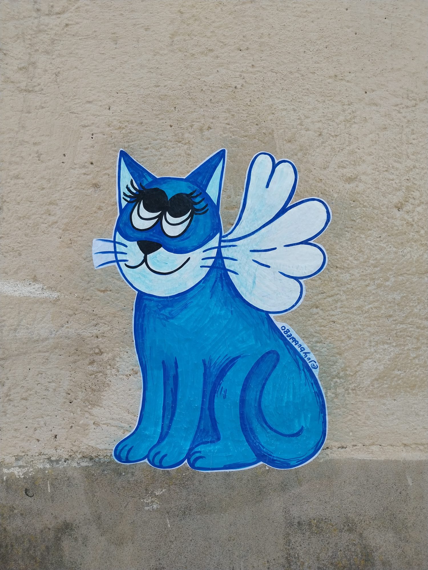 Chat bleu ailé Mascara — Street art à Nantes