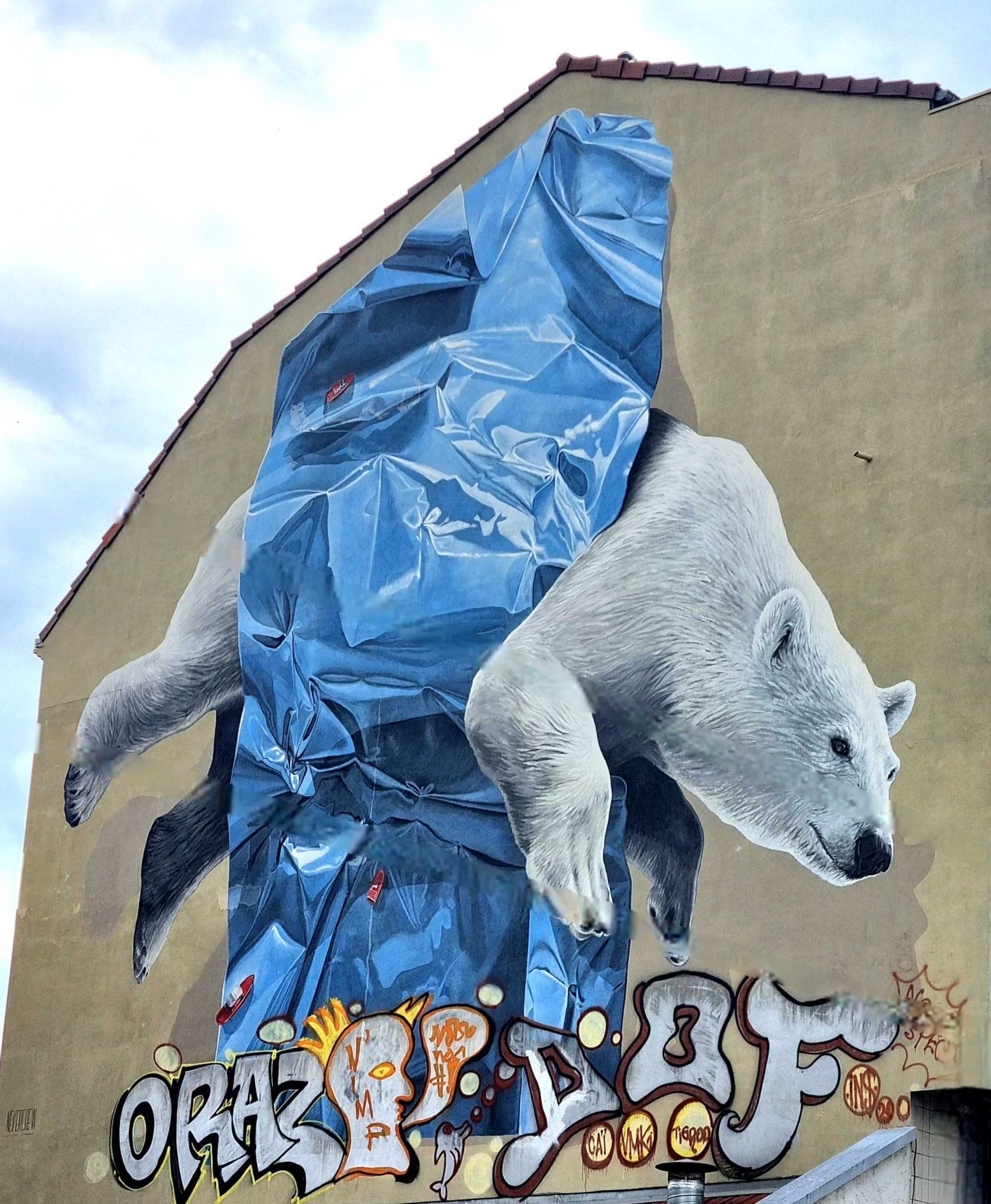 Realistic Polar Bear Carrying Blue Plastic — Street art by Nevercrew in Grenoble