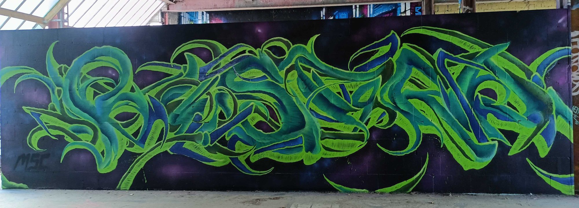 Green Wildstyle on a Purple Ground — Street art in Berlin