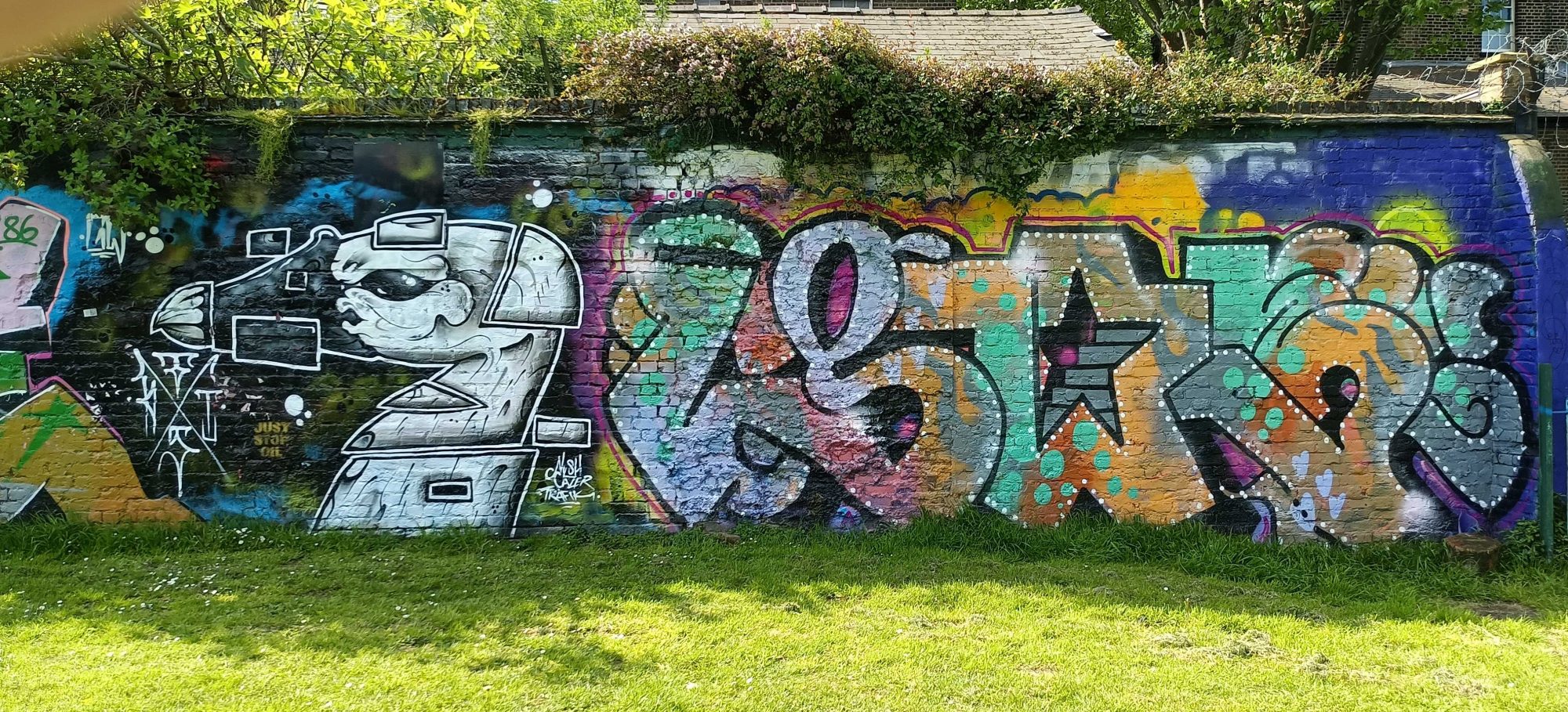 White Robot and Starred Lettering — Street art in London