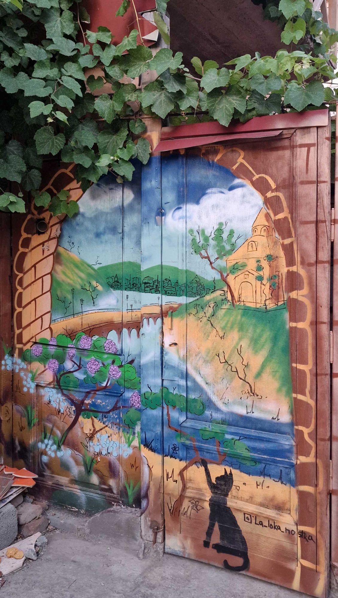 Door onto Landscape — Street art in Tbilisi