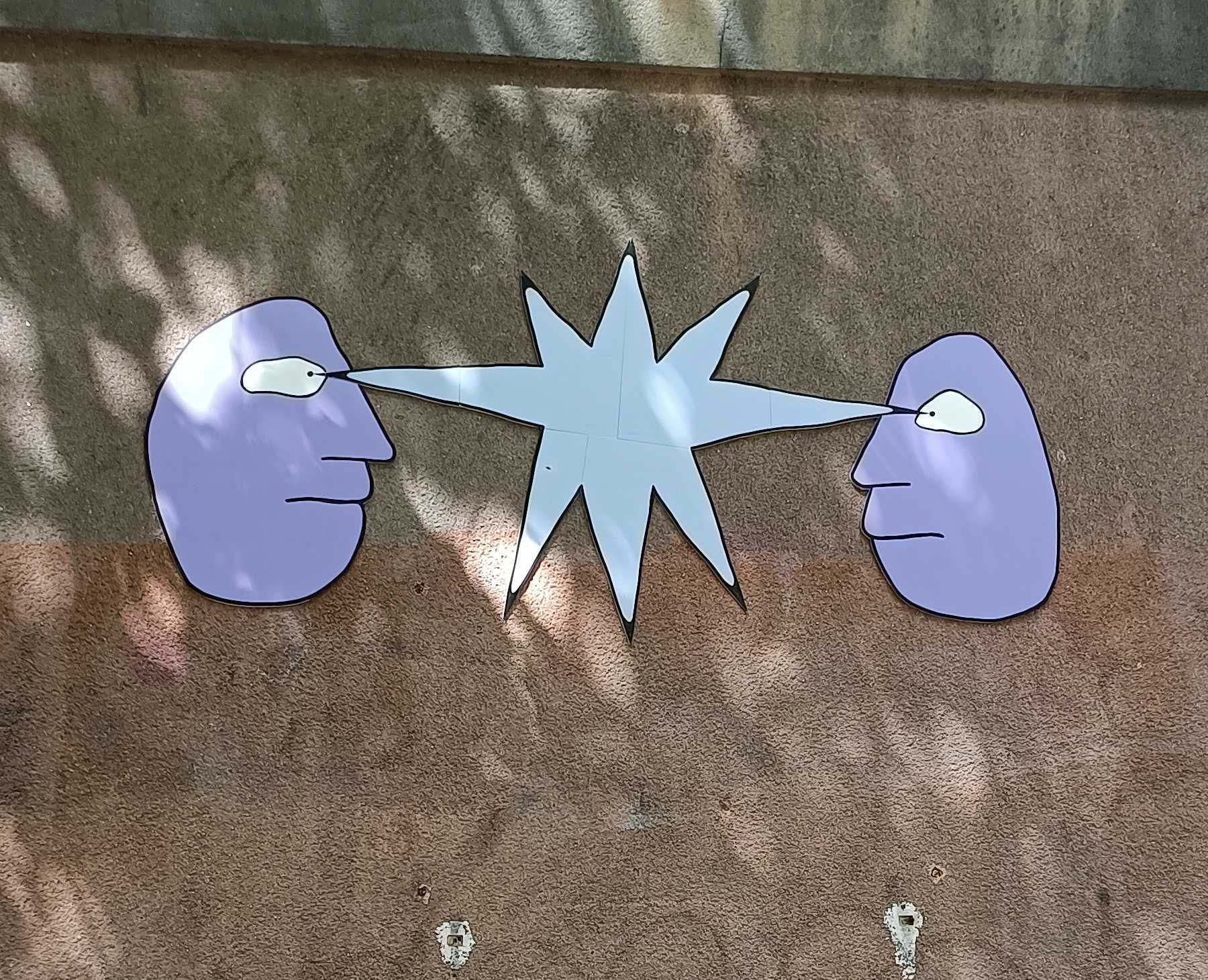 The Two Profiles and the White Star — Street art by Chinelo in Prague