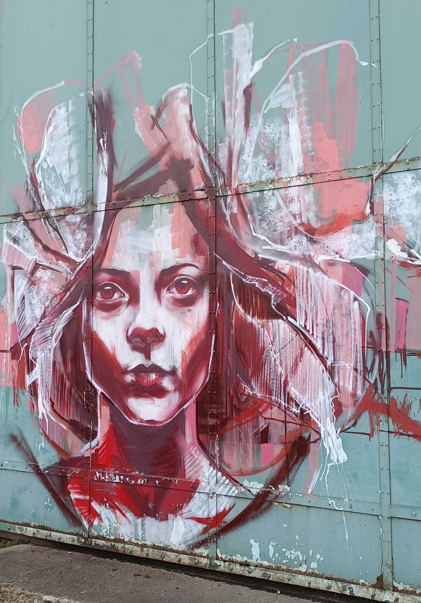 Red and White Female Portrait by Jef — Street art by Jef in Redon