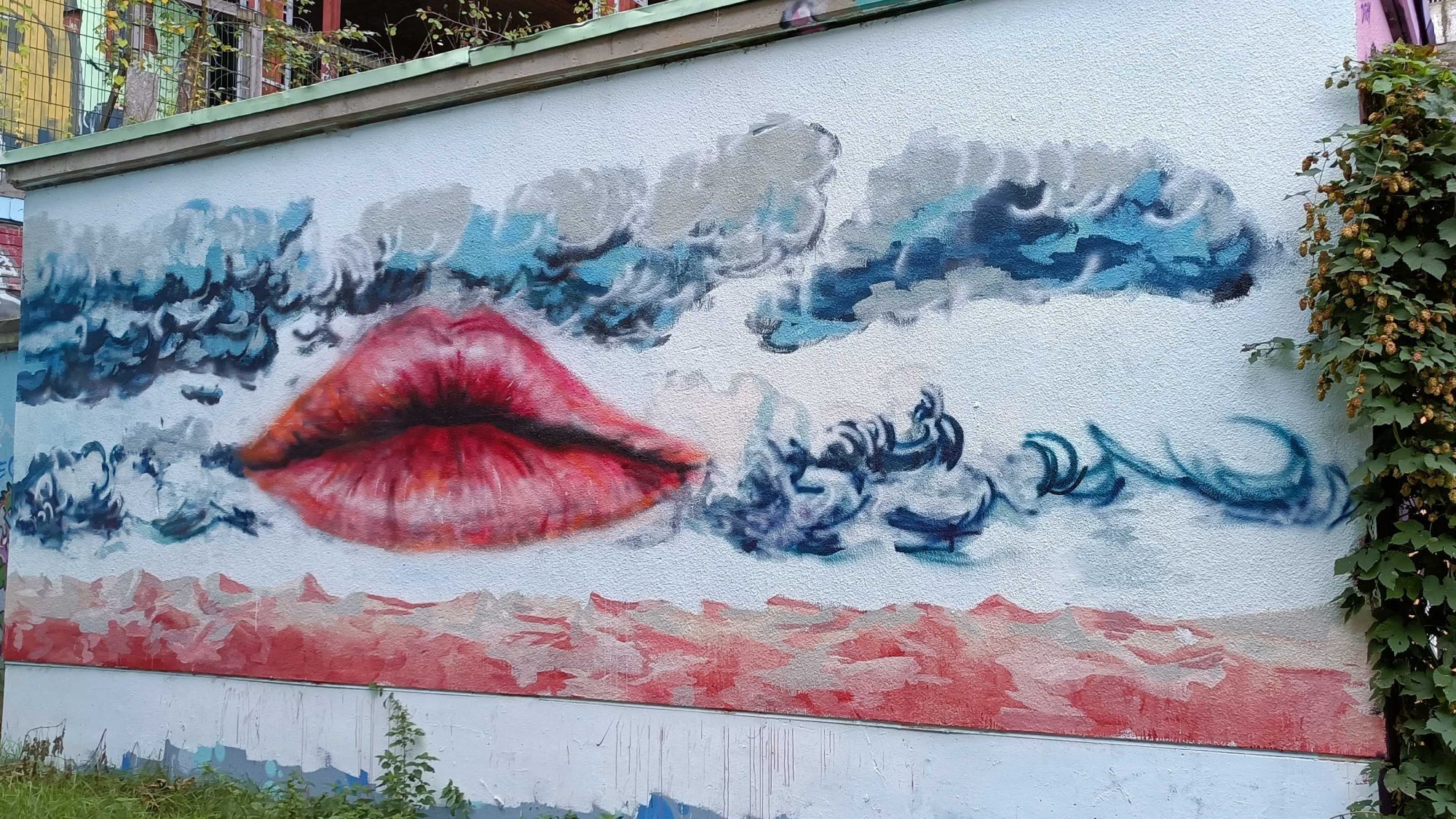 Red Lips and Clouds, Surrealist Composition — Street art in Berlin