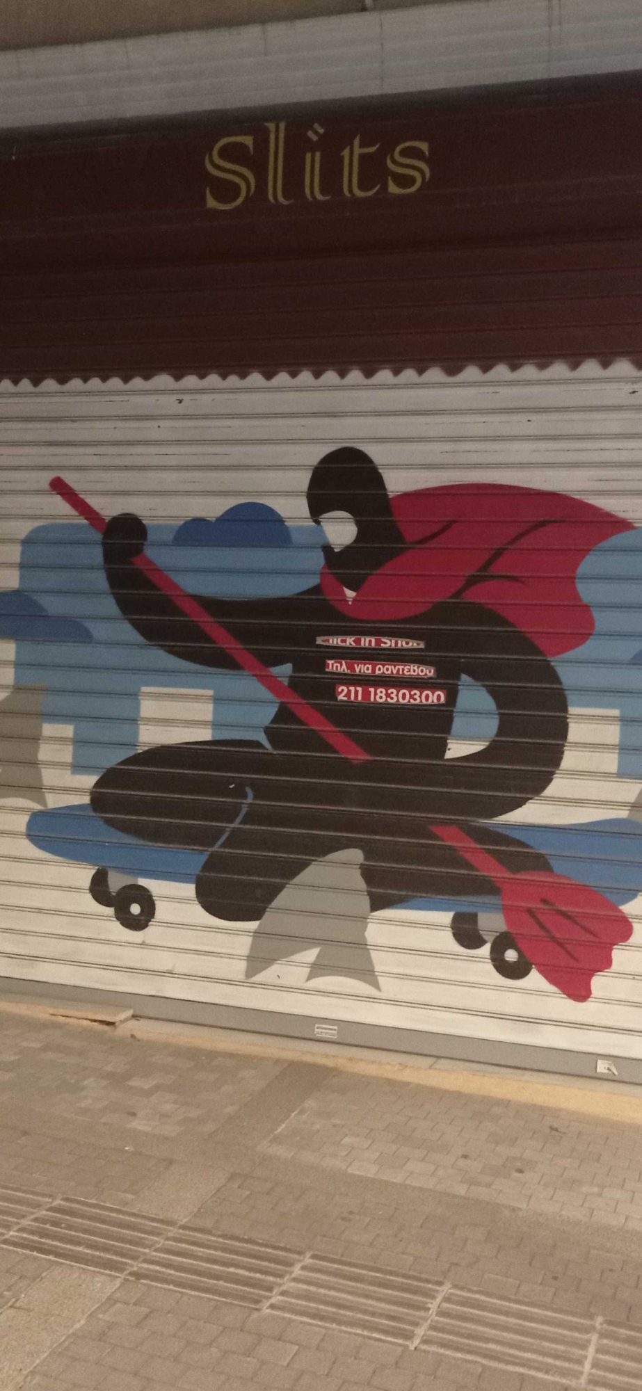 Ninja Skater on Iron Shutter — Street art in Athina