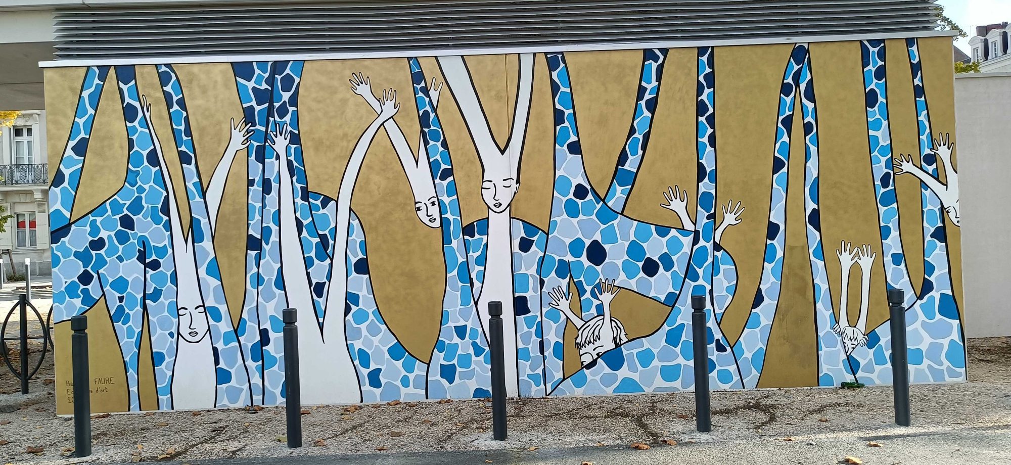Giraffes with Human Faces — Street art in Angers