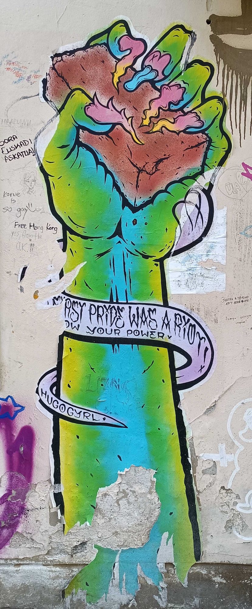Raised Fist, First Pryde Was a Ryot — Street art in Vilnius