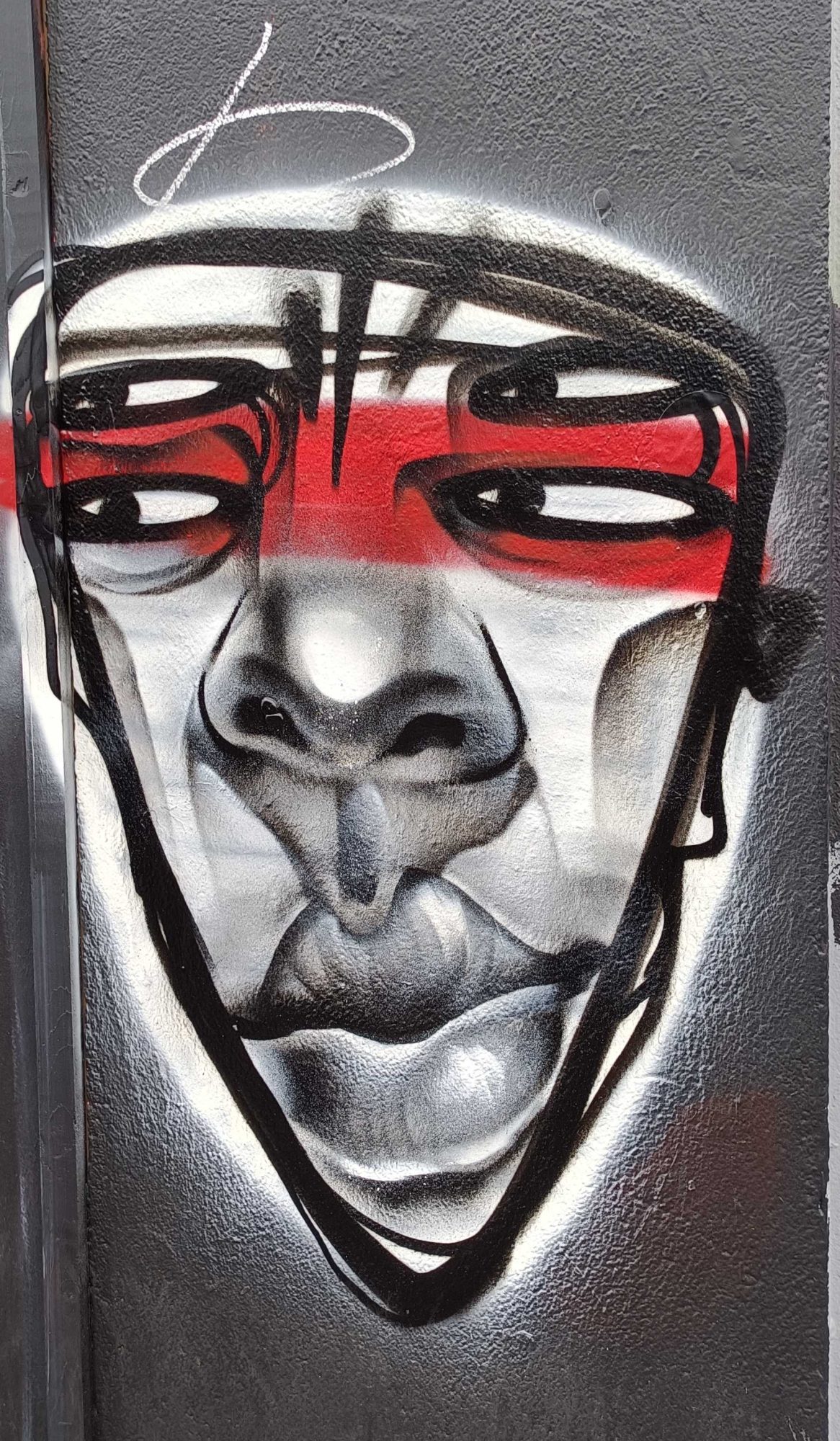 Mask with a Red Band — Street art in London