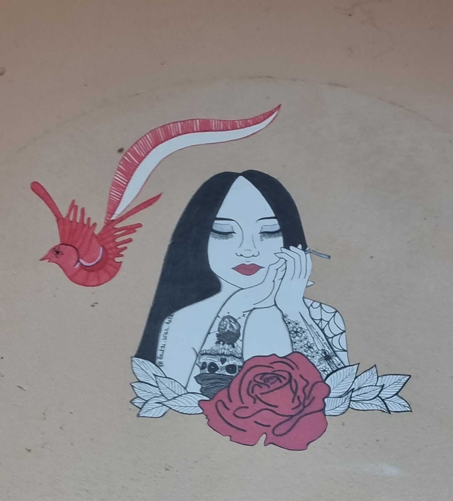 The Girl and the Red Bird — Street art in Strasbourg